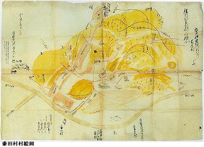淡い色彩で山や里が描かれている、黍田村村絵図の写真