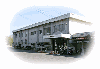 「小野市立コミュニティセンター下東条・小野市立市民研修センター」の写真。白い長方形の建物の全体図が撮影されている。